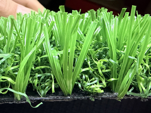 New type artificial field football grass.JPG